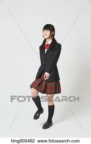 Japanese High-school student in uniform against white background View Large Photo Image Stock Image - Japanese High-school student in uniform against white background. Fotosearch