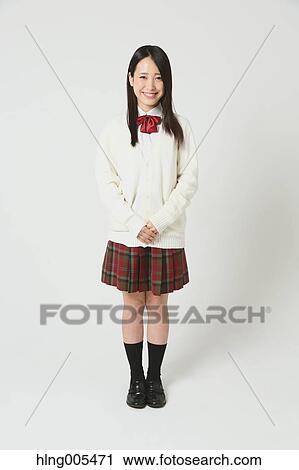 Japanese High-school student in uniform against white background View Large Photo Image Stock Image - Japanese High-school student in uniform against white background. Fotosearch