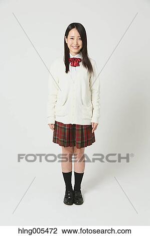 Japanese High-school student in uniform against white background View Large Photo Image Stock Image - Japanese High-school student in uniform against white background. Fotosearch