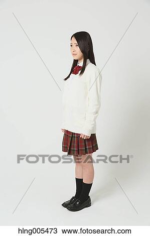 Japanese High-school student in uniform against white background View Large Photo Image Stock Image - Japanese High-school student in uniform against white background. Fotosearch