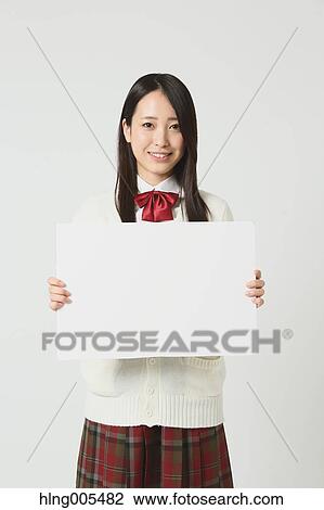 Japanese High-school student in uniform against white background View Large Photo Image Stock Image - Japanese High-school student in uniform against white background. Fotosearch
