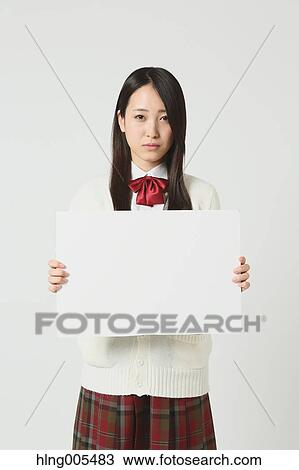 Japanese High-school student in uniform against white background View Large Photo Image Stock Image - Japanese High-school student in uniform against white background. Fotosearch