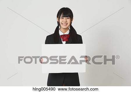 Japanese High-school student in uniform against white background View Large Photo Image Stock Image - Japanese High-school student in uniform against white background. Fotosearch