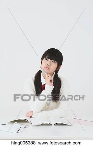 Japanese High-school student in uniform against white background View Large Photo Image Stock Photo - Japanese High-school student in uniform against white background. Fotosearch