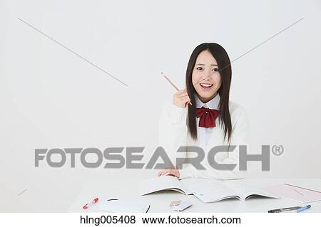 Japanese High-school student in uniform against white background View Large Photo Image Stock Photo - Japanese High-school student in uniform against white background. Fotosearch