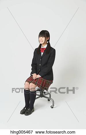 Japanese High-school student in uniform against white background View Large Photo Image Stock Photo - Japanese High-school student in uniform against white background. Fotosearch