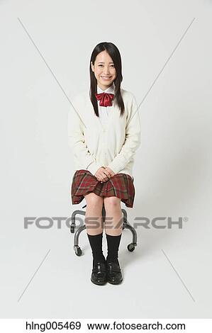 Japanese High-school student in uniform against white background View Large Photo Image Stock Photo - Japanese High-school student in uniform against white background. Fotosearch