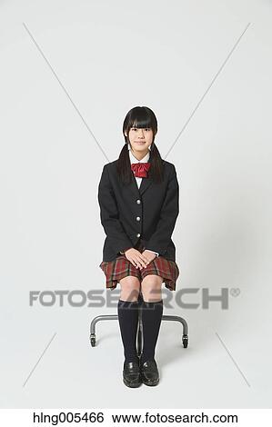 Japanese High-school student in uniform against white background View Large Photo Image Stock Photograph - Japanese High-school student in uniform against white background. Fotosearch