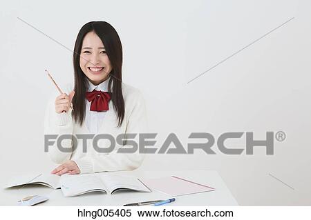 Japanese High-school student in uniform against white background View Large Photo Image Stock Photography - Japanese High-school student in uniform against white background. Fotosearch
