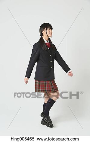 Japanese High-school student in uniform against white background View Large Photo Image Stock Photography - Japanese High-school student in uniform against white background. Fotosearch
