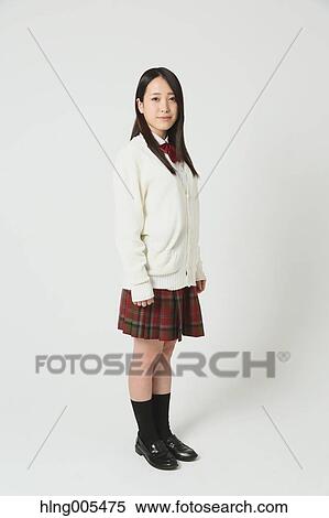 Japanese High-school student in uniform against white background View Large Photo Image Stock Photography - Japanese High-school student in uniform against white background. Fotosearch