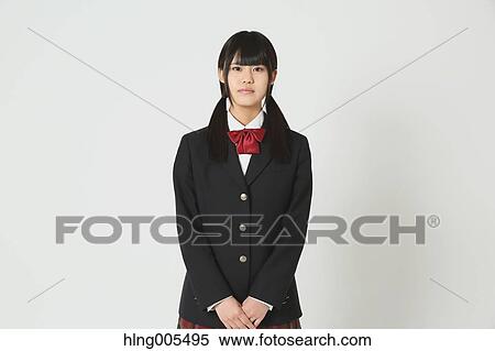 Japanese High-school student in uniform against white background View Large Photo Image Stock Photography - Japanese High-school student in uniform against white background. Fotosearch