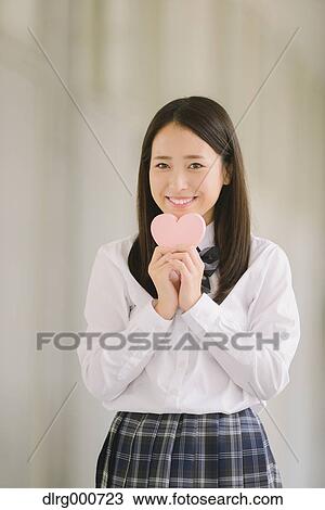 Stock Image - Japanese high-school student portrait. Fotosearch