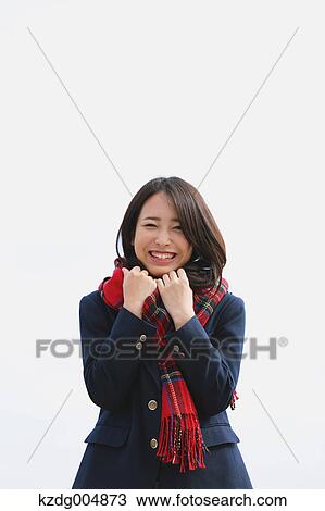 Japanese high-school student with scarf against blue sky View Large Photo Image Stock Image - Japanese high-school student with scarf against blue sky. Fotosearch