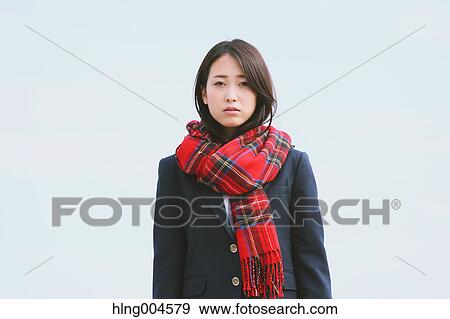 Japanese high-school student with scarf against blue sky View Large Photo Image Stock Photo - Japanese high-school student with scarf against blue sky. Fotosearch