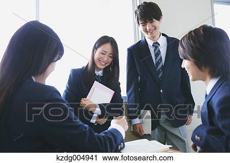 Stock Image - Japanese high-school students after class. Fotosearch