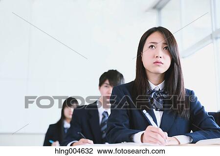 Japanese high-school students during a lesson View Large Photo Image Stock Image - Japanese high-school students during a lesson. Fotosearch