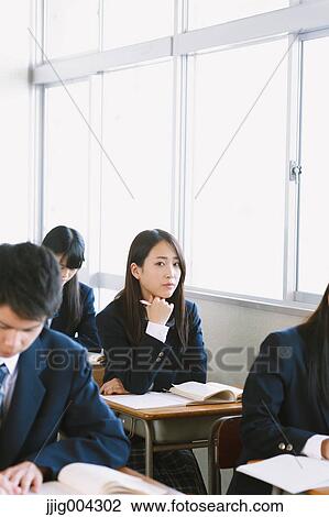 Japanese high-school students during a lesson View Large Photo Image Stock Image - Japanese high-school students during a lesson. Fotosearch