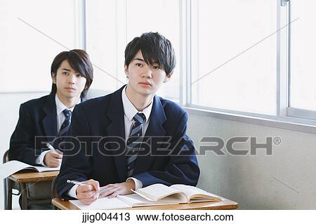 Stock Image - Japanese high-school students during a lesson. Fotosearch