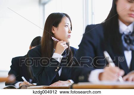 Japanese high-school students during a lesson View Large Photo Image Stock Image - Japanese high-school students during a lesson. Fotosearch