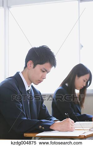 Stock Photography - Japanese high-school students during a lesson. Fotosearch