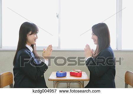 Japanese high-school students having bento in classroom View Large Photo Image Stock Photo - Japanese high-school students having bento in classroom. Fotosearch