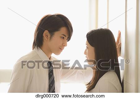 Japanese high-school students in a romantic moment in the school corridor View Large Photo Image Stock Image - Japanese high-school students in a romantic moment in the school corridor. Fotosearch