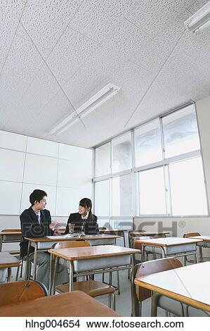 Japanese high-school students in empty classroom View Large Photo Image Picture - Japanese high-school students in empty classroom. Fotosearch