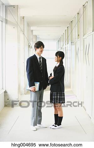 Stock Photography - Japanese high-school students in school corridor. Fotosearch