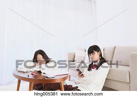 Japanese High-school students in uniform studying together View Large Photo Image Stock Image - Japanese High-school students in uniform studying together. Fotosearch