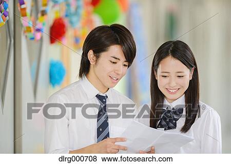 Stock Photo - Japanese high-school students in decorated school corridor. Fotosearch