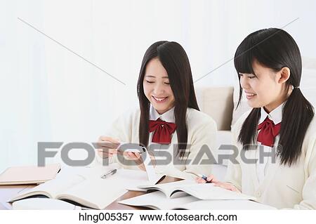 Japanese High-school students in uniform studying together View Large Photo Image Stock Photo - Japanese High-school students in uniform studying together. Fotosearch