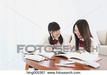Japanese High-school students in uniform studying together View Large Photo Image Stock Photo - Japanese High-school students in uniform studying together. Fotosearch