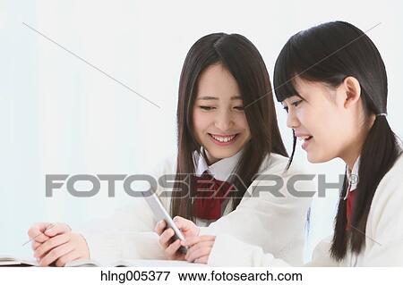 Japanese High-school students in uniform studying together View Large Photo Image Stock Photo - Japanese High-school students in uniform studying together. Fotosearch