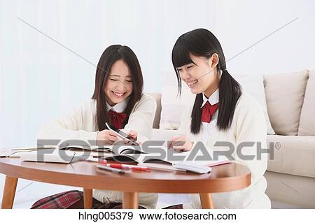 Japanese High-school students in uniform studying together View Large Photo Image Stock Photo - Japanese High-school students in uniform studying together. Fotosearch