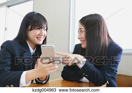 Japanese high-school students with smartphone in classroom View Large Photo Image Stock Image - Japanese high-school students with smartphone in classroom. Fotosearch