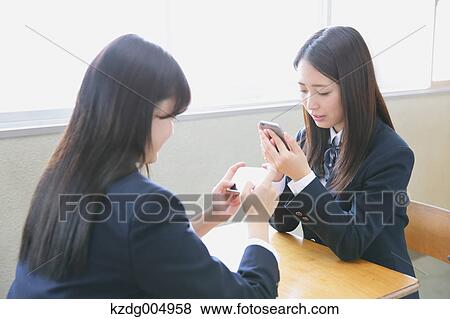 Japanese high-school students with smartphone in classroom View Large Photo Image Stock Photo - Japanese high-school students with smartphone in classroom. Fotosearch