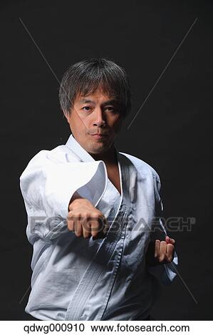 Stock Image - Japanese karate master training. Fotosearch