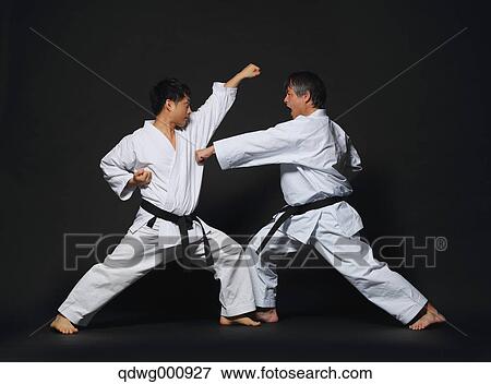 Japanese karate masters fighting View Large Photo Image Stock Photo - Japanese karate masters fighting. Fotosearch