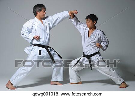Stock Photo - Japanese karate masters fighting. Fotosearch