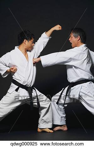 Japanese karate masters fighting View Large Photo Image Stock Photography - Japanese karate masters fighting. Fotosearch