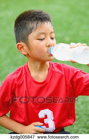 Japanese kid at soccer field View Large Photo Image Stock Photo - Japanese kid at soccer field. Fotosearch