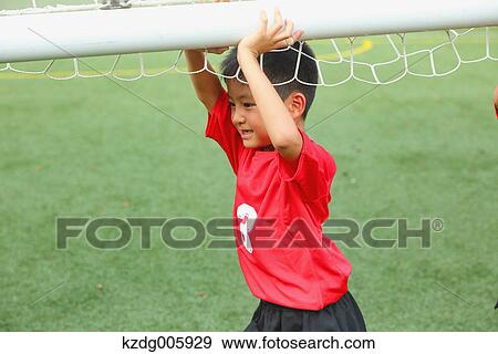 Japanese kid at soccer field View Large Photo Image Stock Photo - Japanese kid at soccer field. Fotosearch