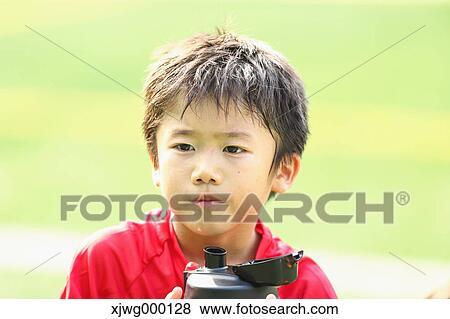 Japanese kid at soccer field View Large Photo Image Stock Photo - Japanese kid at soccer field. Fotosearch