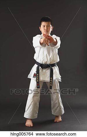 Japanese kid in karate uniform on black background View Large Photo Image Picture - Japanese kid in karate uniform on black background. Fotosearch