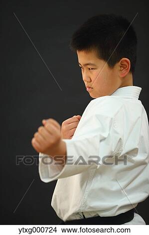 Japanese kid in karate uniform on black background View Large Photo Image Picture - Japanese kid in karate uniform on black background. Fotosearch