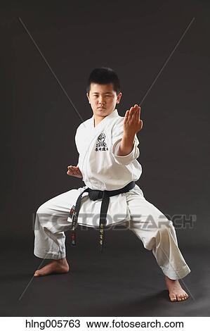 Japanese kid in karate uniform on black background View Large Photo Image Stock Image - Japanese kid in karate uniform on black background. Fotosearch