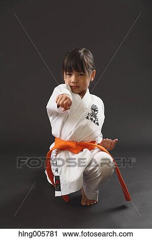 Japanese kid in karate uniform on black background View Large Photo Image Stock Image - Japanese kid in karate uniform on black background. Fotosearch