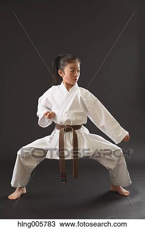 Japanese kid in karate uniform on black background View Large Photo Image Stock Image - Japanese kid in karate uniform on black background. Fotosearch