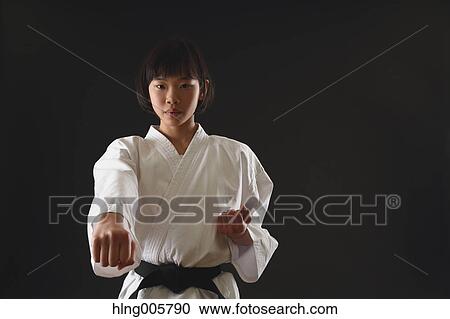 Japanese kid in karate uniform on black background View Large Photo Image Stock Image - Japanese kid in karate uniform on black background. Fotosearch